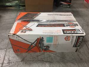 RIDGID 7 in. Tile saw with stand in good condition