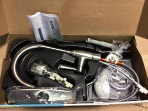 Noell Single-Handle Standard Kitchen Faucet with Side Sprayer in Spot Resist Stainless by MOEN in good condition
