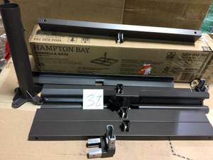 Steel Outdoor Patio Umbrella Base in Brown by Hampton Bay in good condition