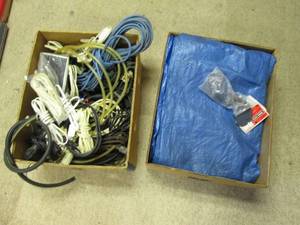 Box of extension cords and 2 tarps...