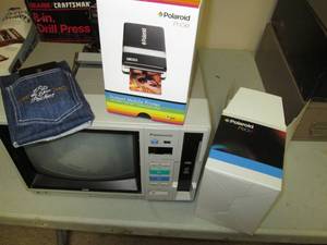 Panasonic VHS player and Polaroid P...