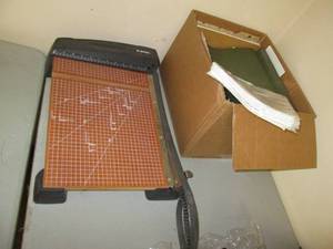 Xacto paper cutter and hanging file...