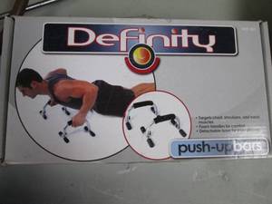 Push up bars and blue sled disc...