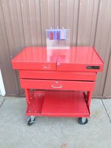 Rolling tool cart with slide apart top & drawer. Appears new. As shown.