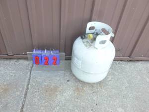 20 lb propane tank with new style valve. Used condition. As shown.