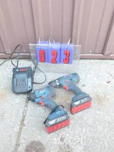 Bosch 18 volt cordless drill & driver. Includes 2 batteries & charger. Used condition. As shown.