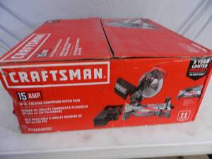 lot 38 image: New Craftsman 10 inch Folding Miter Saw