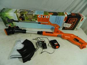 lot 86 image: Black and Decker 20 volt Cordless String Trimmer  Edger