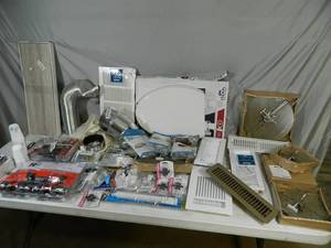 lot 128 image: New and Open Pkg Hardware, Door Knobs, Vent Covers, Toilet Seat, and More
