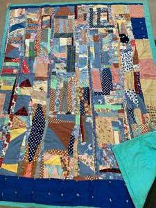 lot 53 image: Handmade Quilt 61 X 81
