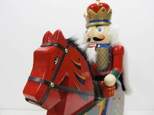 lot 94 image: Wooden Christmas Nutcracker Soldier on Rocking Horse