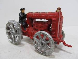 lot 304 image: Vintage Cast Iron Ford Toy Tractor and Driver