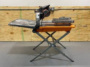 lot 19 image: RIDGID 12 Amp Corded 8 in. Wet Tile Saw with Stand
