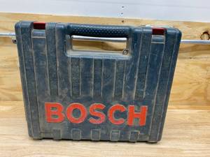 lot 33 image: BOSCH 1199VSR 8.5-Amp 12-Inch Hammer Drill with Case