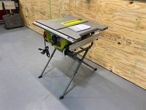 lot 47 image: RYOBI 15 Amp 10 in. Table Saw with Folding Stand