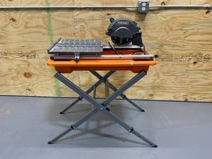 lot 50 image: RIDGID 9 Amp Corded 7 in. Wet Tile Saw with Stand