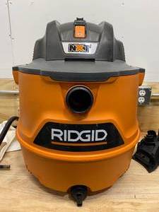 lot 53 image: RIDGID 16 Gal. 6.5-Peak HP NXT WetDry Shop Vacuum with Cart, Filter, Hose and Accessories