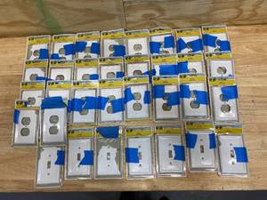 lot 101 image: HAMPTON BAY Lot of 26- Ascher 1 Gang Duplex Steel Wall Plates - White and 7- Ascher 1 Gang Toggle Steel Wall Plates- White