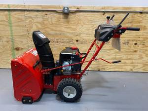 lot 1 image: TROY-BILT 24 in. 208 cc Two-Stage Gas Snow Blower with Electric Start Self Propelled