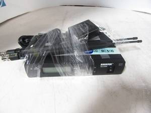 lot 28 image: SHURE XLXP4 with antennas, assessories