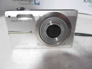 lot 63 image: Olympus FE FE-370 8.0MP Digital Camera - Silver Comes with carry strap & battery Light blemishesscratches.