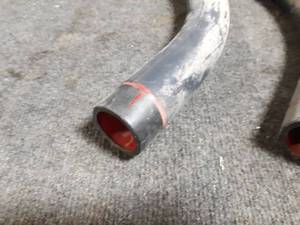 lot 129 image: (4) Plasti-Bond Red-Hat 1-12 90° PVC Coated Conduit