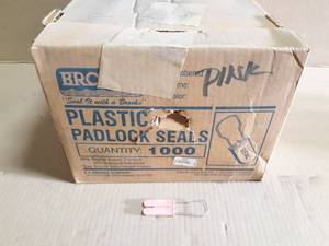 lot 127 image: Case of 1000 Brooks Plastic Padlock Seals - Pink