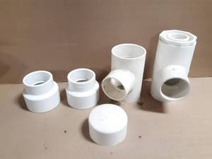 lot 288 image: (5) 4 Schedule 40 PVC Reducers, Tees and Cap
