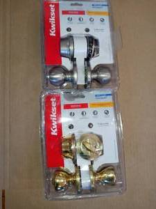 Polo Satin Nickel Entry Door Knob and Single Cylinder Deadbolt Combo Pack  Tylo Polished Brass Entry Door Knob and Single Cylinder Deadbolt Combo PacK by Kwikset - packaging damaged not used