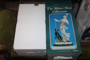 lot 150 image: The Midori Mint Collection Woman with Dog Handpainted Fine Porcelain Figurine
