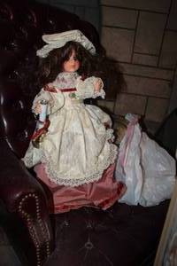 lot 152 image: Girl in White and Pink Dress with Candlestick Doll