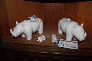 lot 219 image: White Porcelain Rhino Table Dcor 4-Piece Set