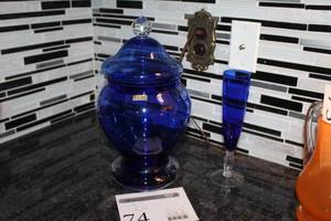 lot 74 image: Lot of (2) Blue Glass Cookie Jar with Lid, Blue Glass Stem Champagne Flute