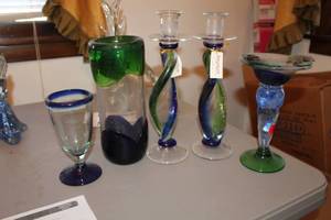 lot 84 image: Lot of (5) Banash BlueGreenClear Glass Table Dcor - Stem Glass, Vase, Candleholders (x2), Stem Vase