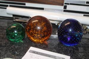 lot 78 image: Lot of (3) Colored Glass Balls Table Dcor