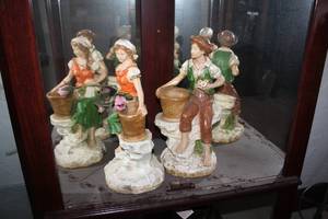 lot 267 image: Lot of (2) Universal Statuary Corp 1975 Man and Woman with Flower Baskets