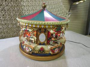 Animated Holiday Carousel Spins, Ho...