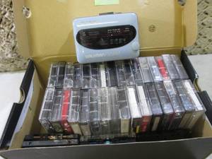 Sony Walkman with Assorted Cassette...