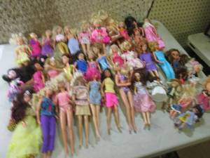 28 Barbie Dolls and Other Misc Doll...