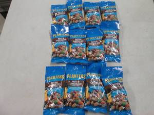 12 packs of Planters nuts and Choco...