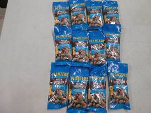 12 packs of Planters nuts and Choco...