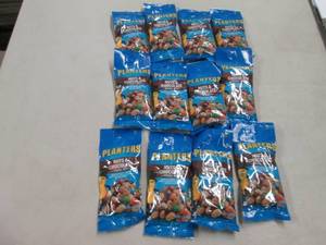 12 packs of Planters nuts and Choco...