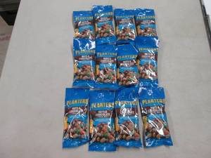 12 packs of Planters nuts and Choco...