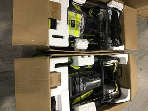 Pallets with Assorted Ryobi mower open boxes batteries and chargers are includes