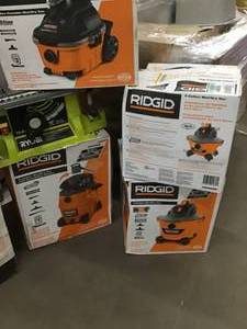 Pallet with assorted Ridgid Vacs open box various sizes and condiotions see pictures