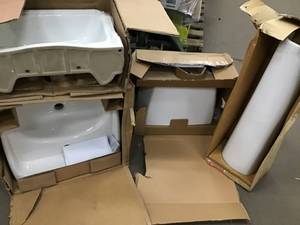 Pallet with Toilet parts sinks and pedestal see pictures