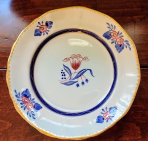 lot 24 image: Calyx Ware Plate Set