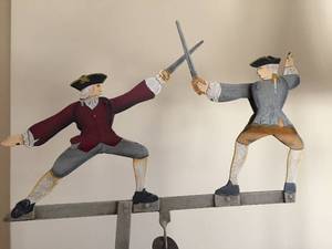 lot 72 image: Metal Home Decor -Balancing Sword Fighters