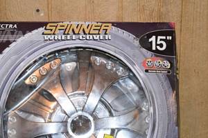 lot 208 image: Spinner Wheel Covers for 15 Wheels Never been used Perfect Christmas gift