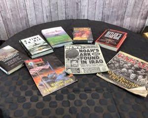 lot 122 image: Military Themed Reading Materials, Videos